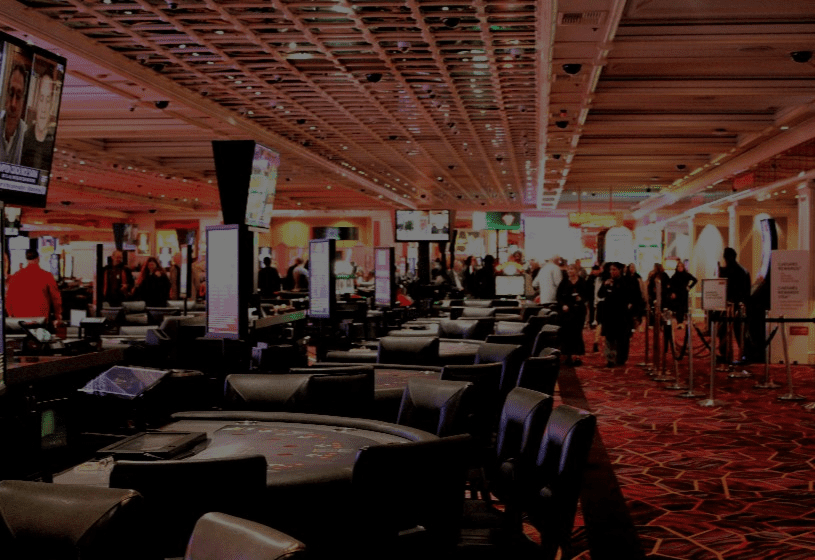 Busy casino with people and screens
