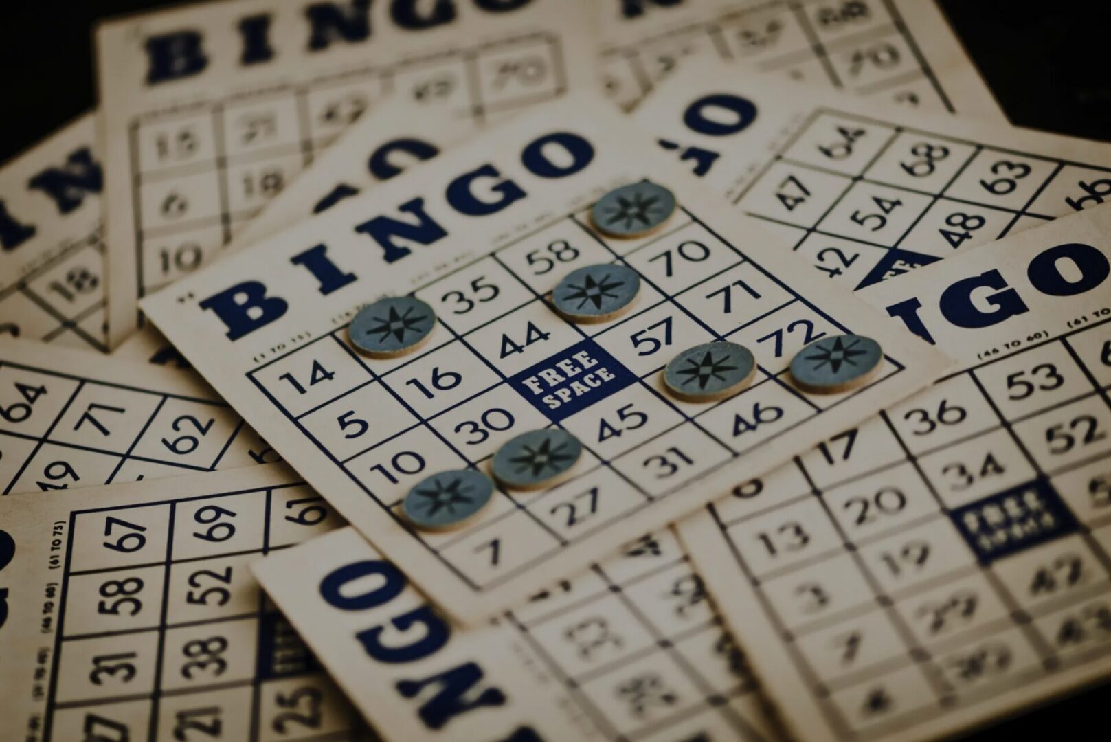 Bingo cards scattered with markers