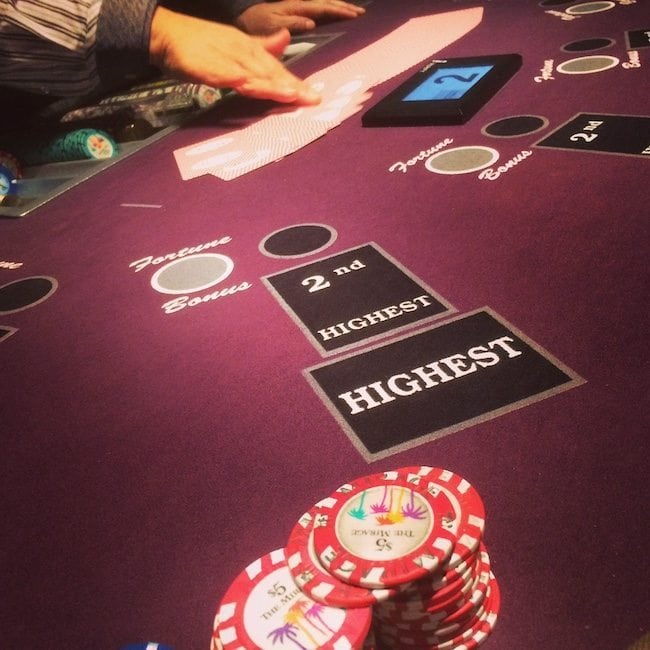 Poker chips stacked on gaming table